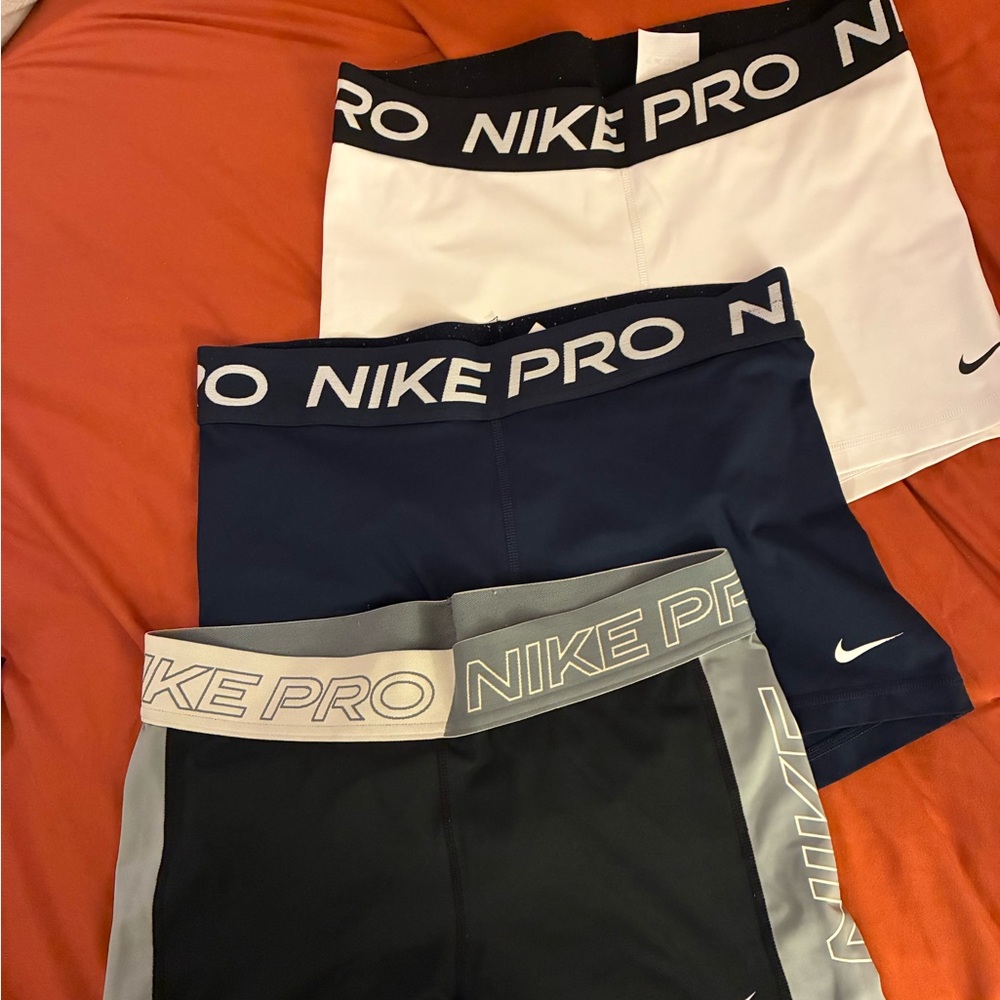 Nike Pro Shorts duo in White and Navy